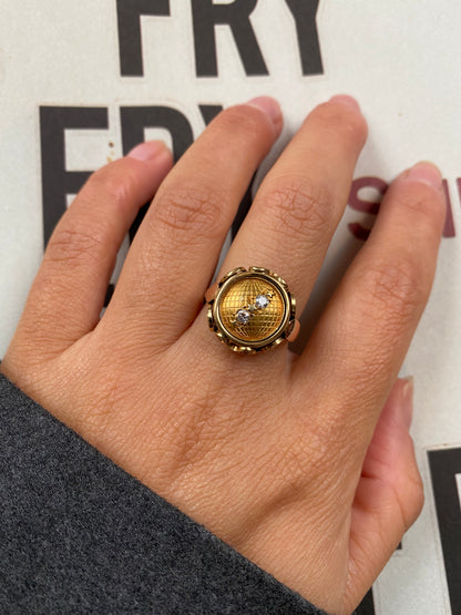 14 carat yellow and rose gold globe coin ring with diamonds