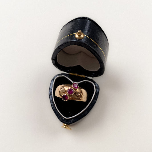 14 carat gold triple pink sapphire gypsy ring