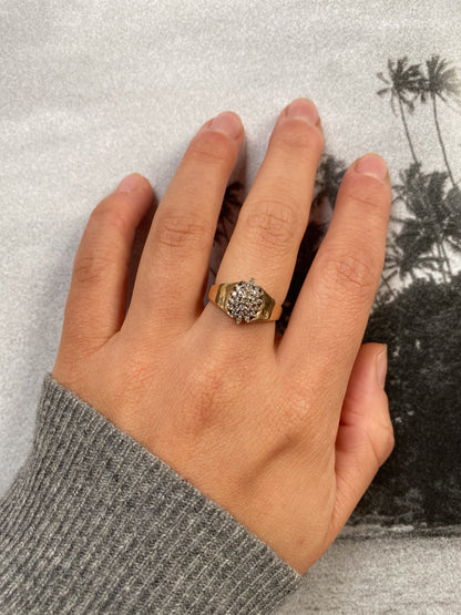 10 carat bold ring with oval diamond cluster