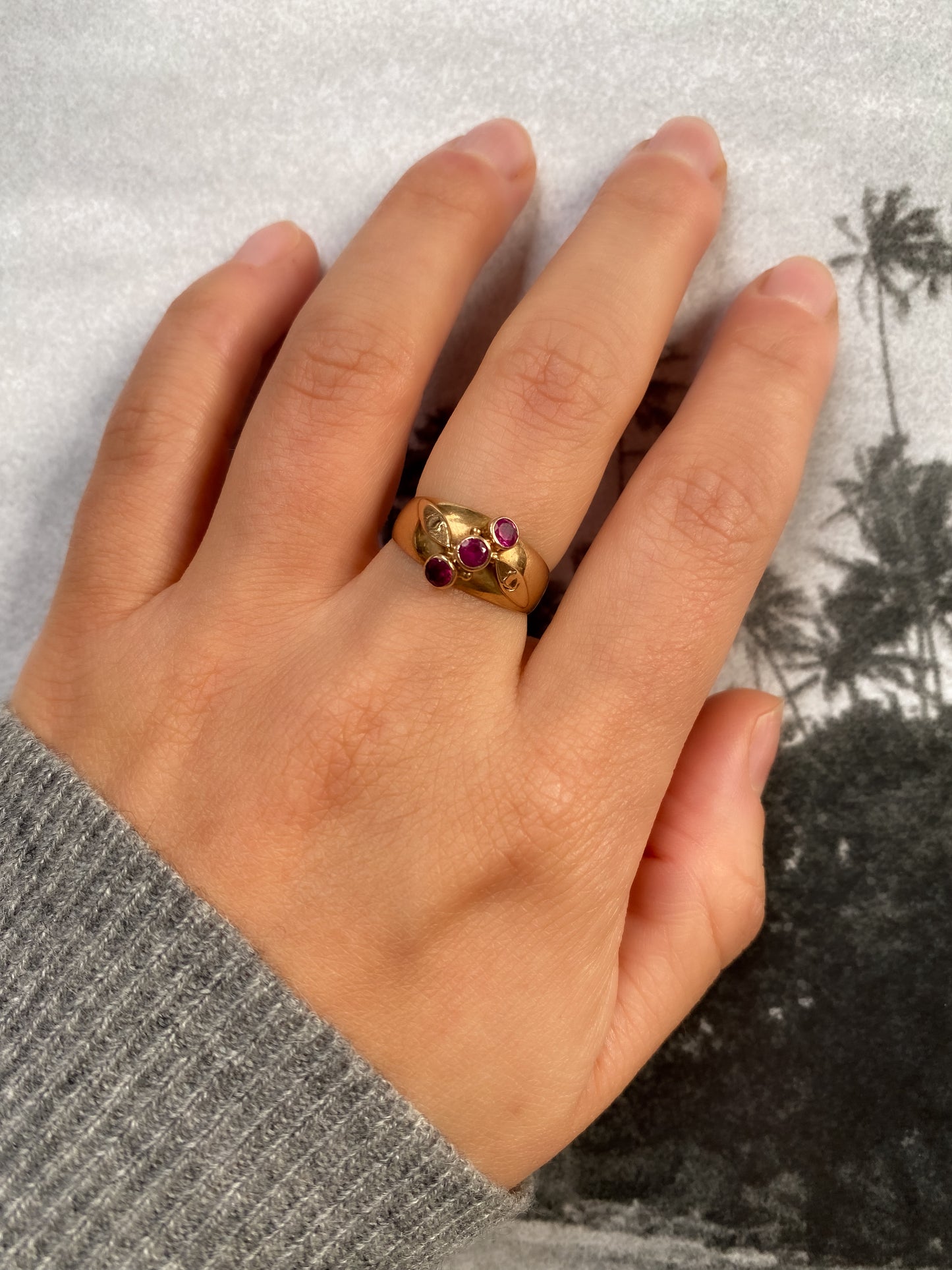 14 carat gold triple pink sapphire gypsy ring
