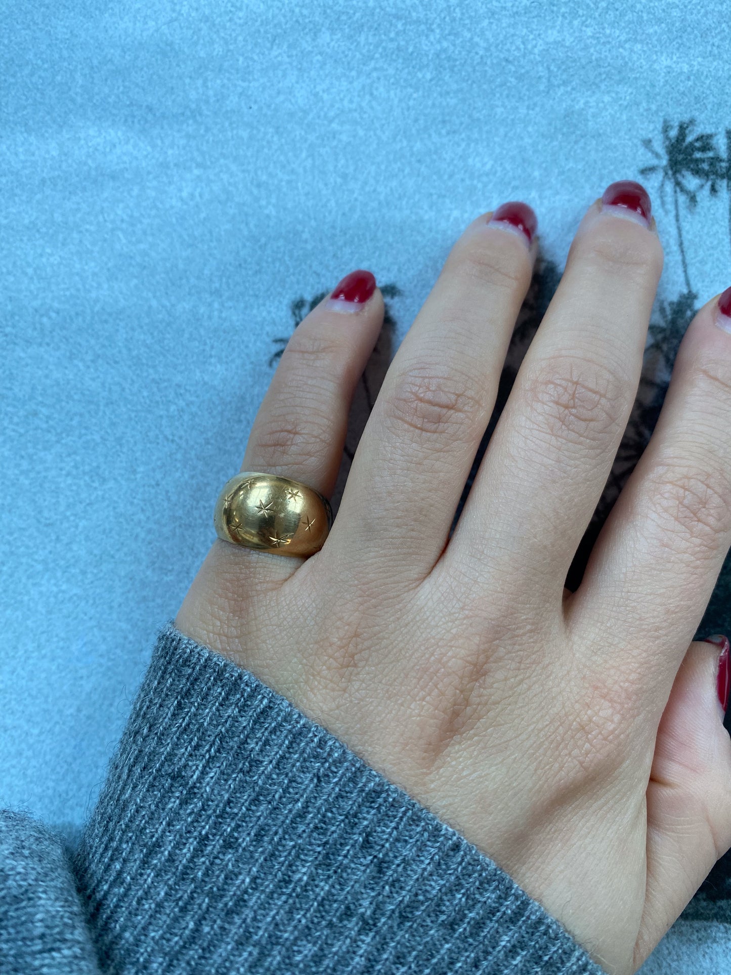 18 carat gold dome ring with engraved stars