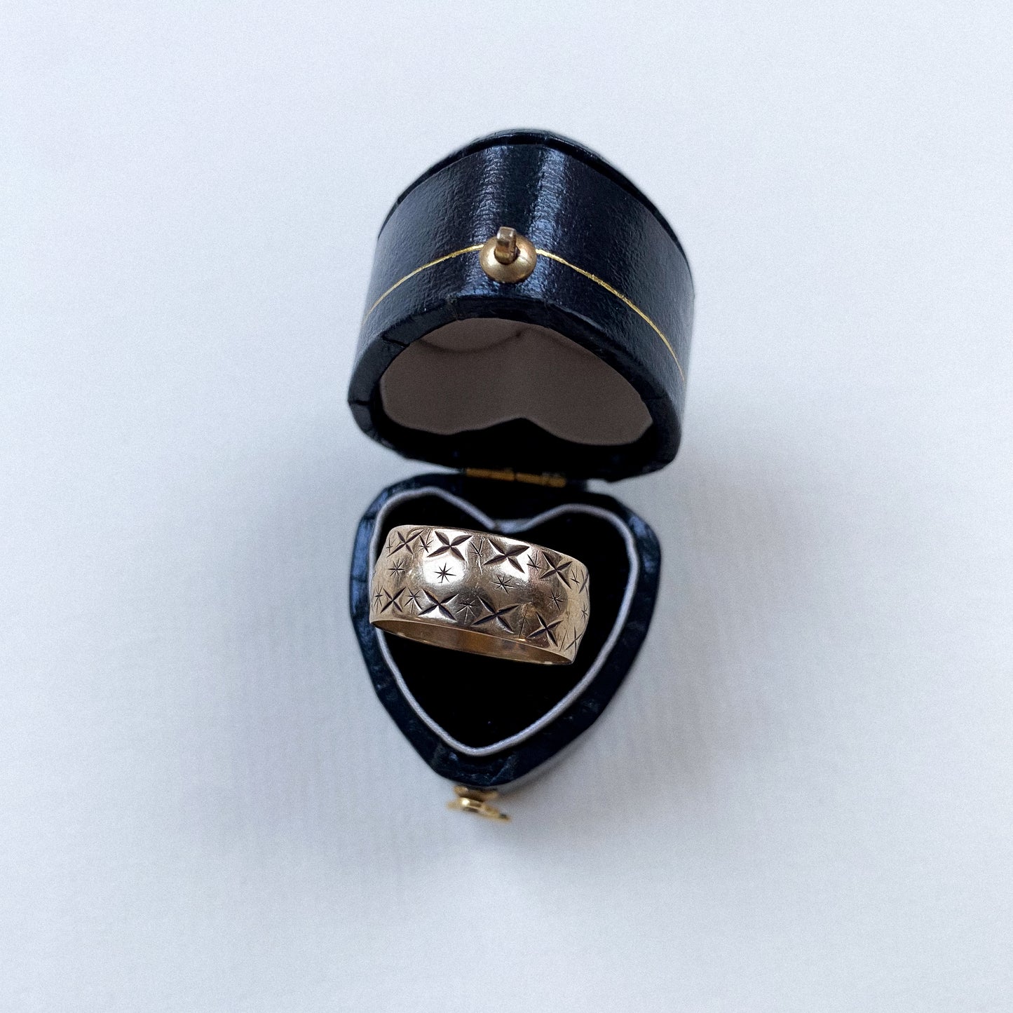 9 carat bold star engraved band ring
