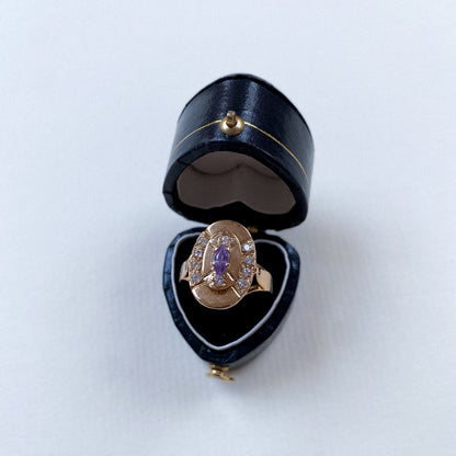18 carat diamond and amethyst oval art deco ring