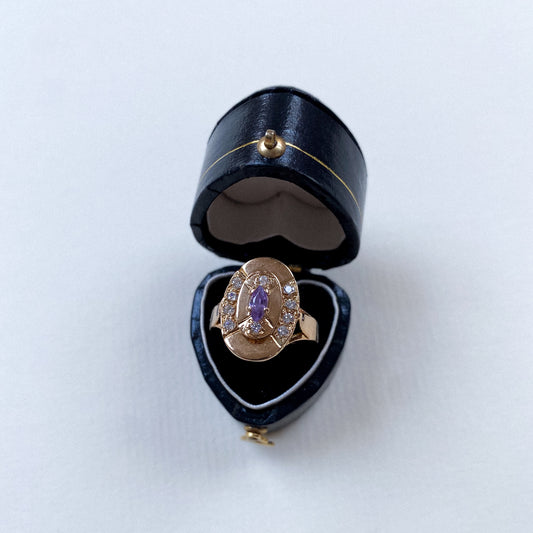 18 carat diamond and amethyst oval art deco ring