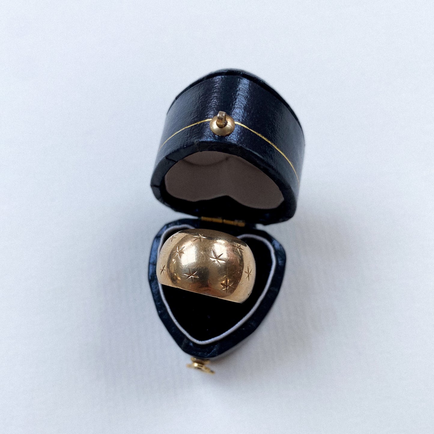 18 carat gold dome ring with engraved stars