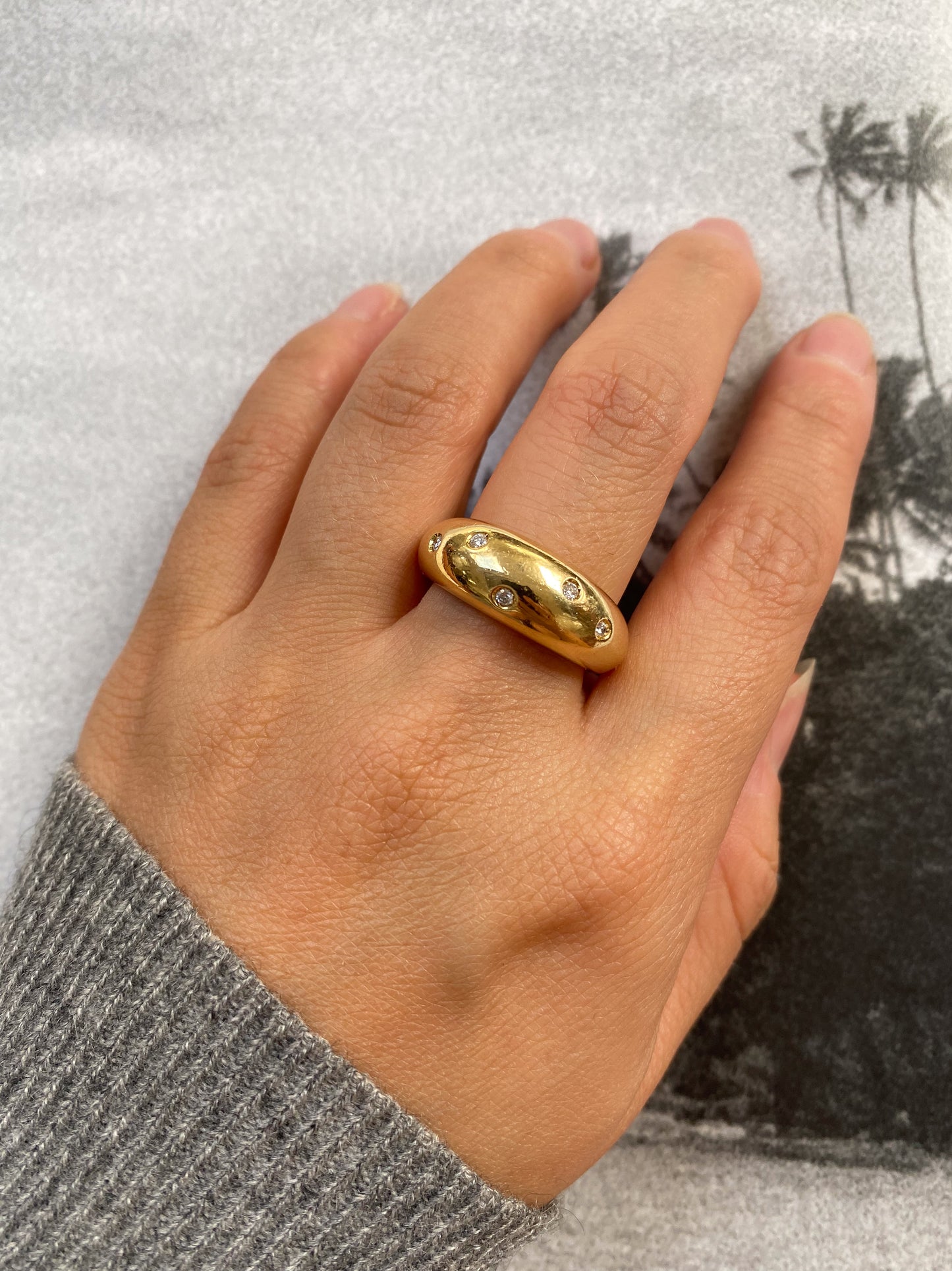 18 carat gold bold dome ring with diamonds