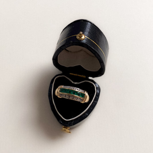 18 carat gold bold emerald and diamond half eternity