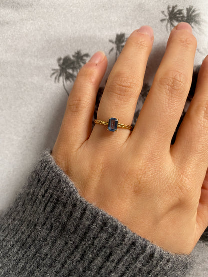 18 carat gold solitaire rectangle aquamarine ring with twisted band