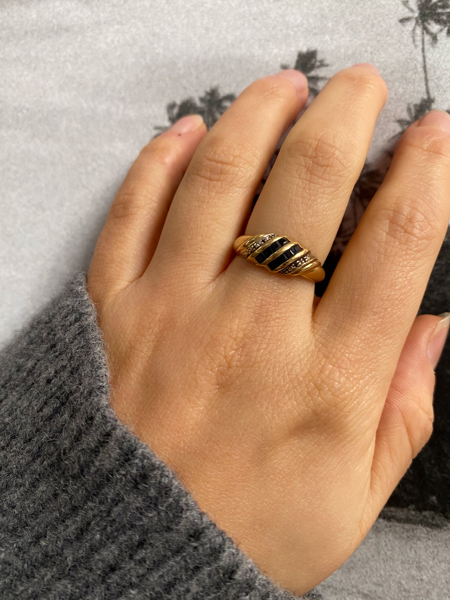 18 carat gold sapphire and diamond croissant ring