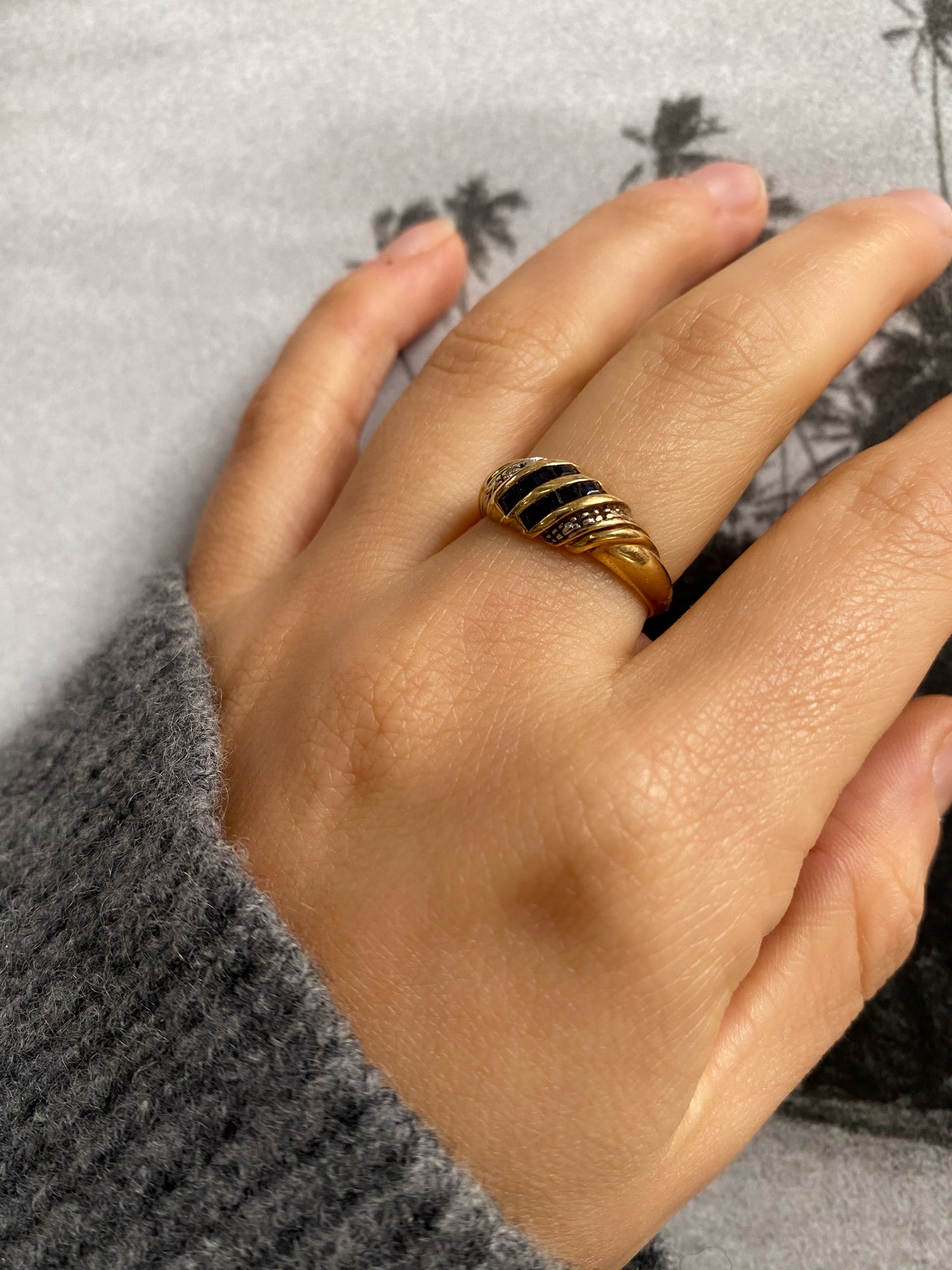 18 carat gold sapphire and diamond croissant ring