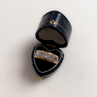 14 carat gold half eternity ring with baguette and round cut strass