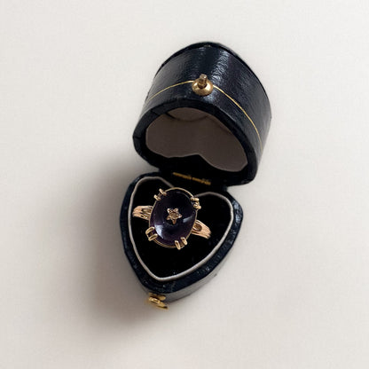 18 carat gold amethyst statement ring with center star