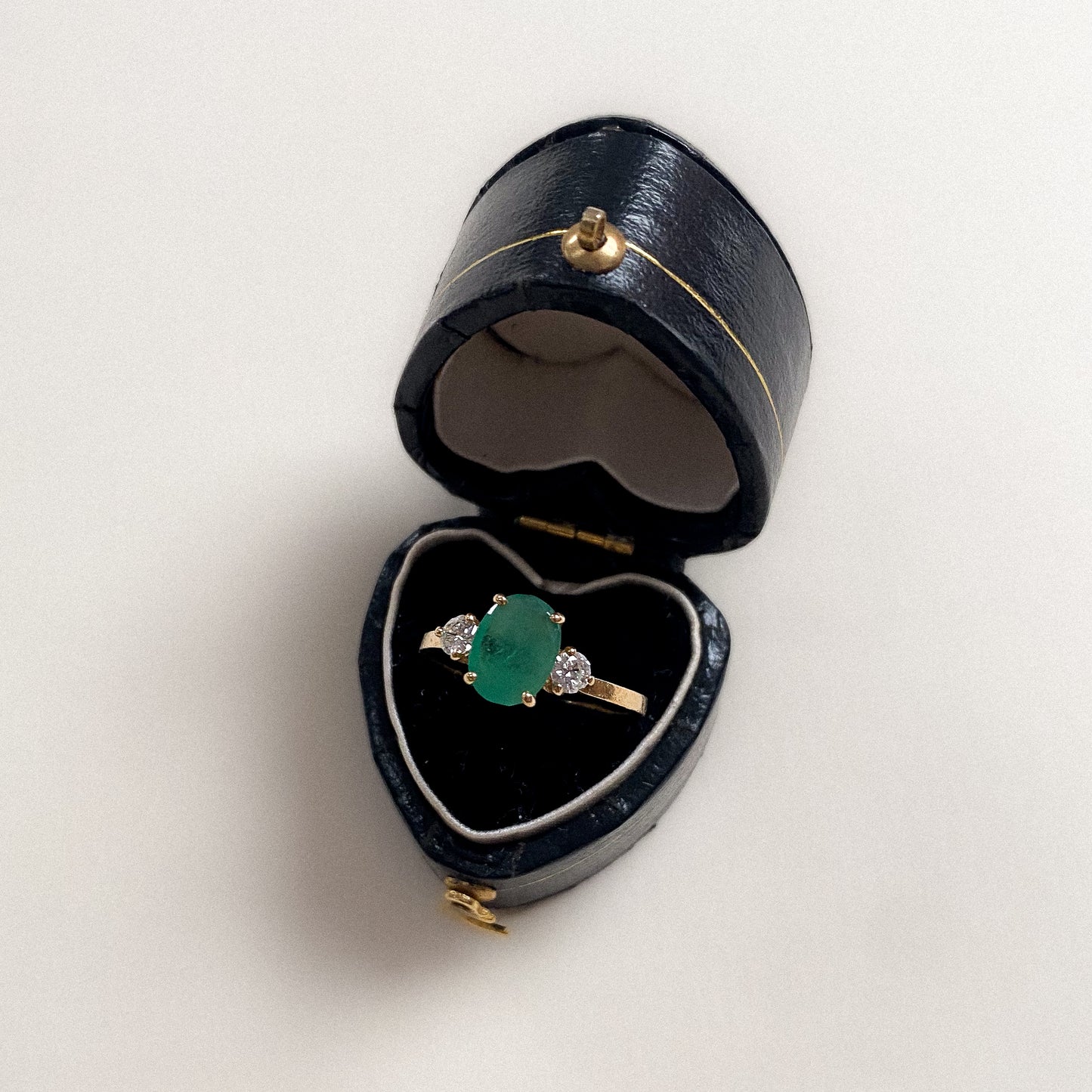 18 carat gold emerald and diamond ring