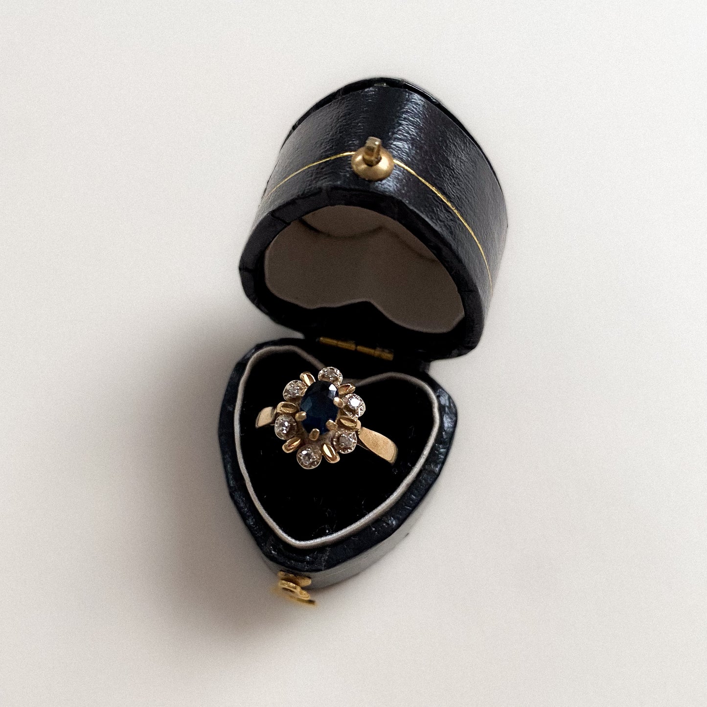 18 carat gold sapphire and diamond cluster ring