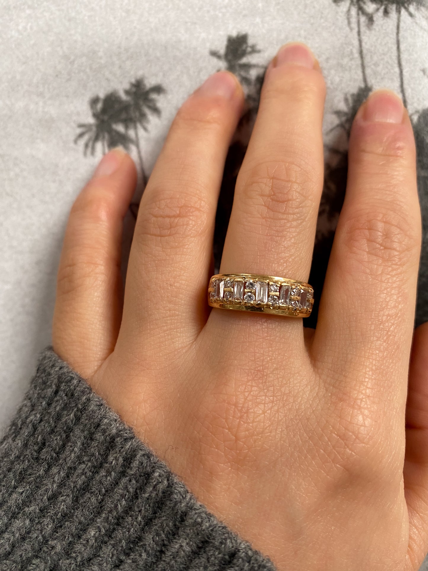 14 carat gold half eternity ring with baguette and round cut strass