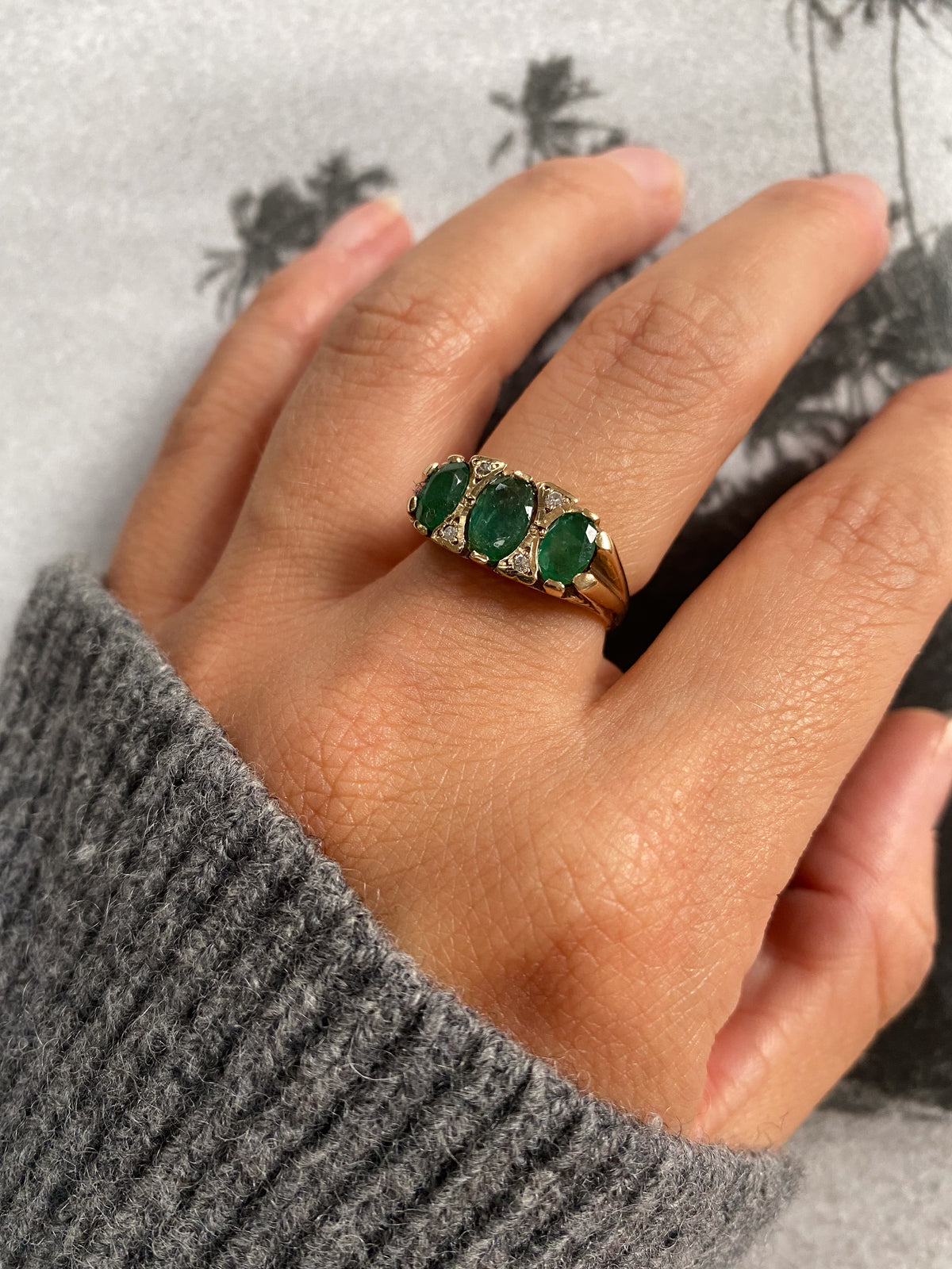 9 carat emerald and diamond ring