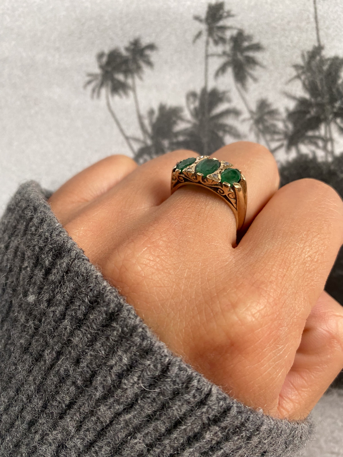 9 carat emerald and diamond ring