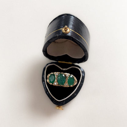 9 carat emerald and diamond ring