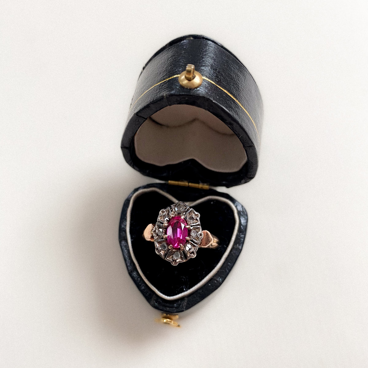 18 carat gold ruby and diamond cluster ring