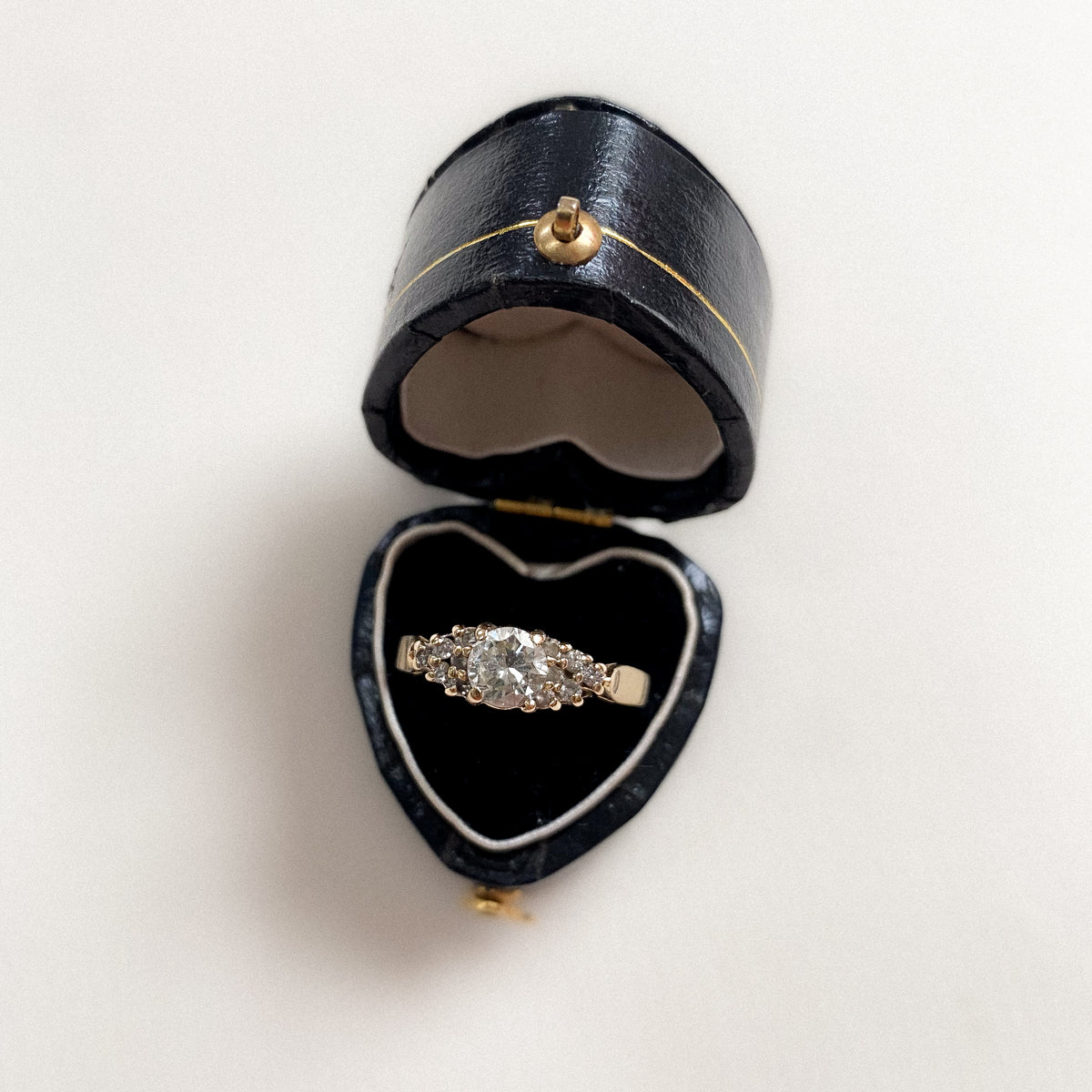 10 carat diamond cluster ring with diamond shouders