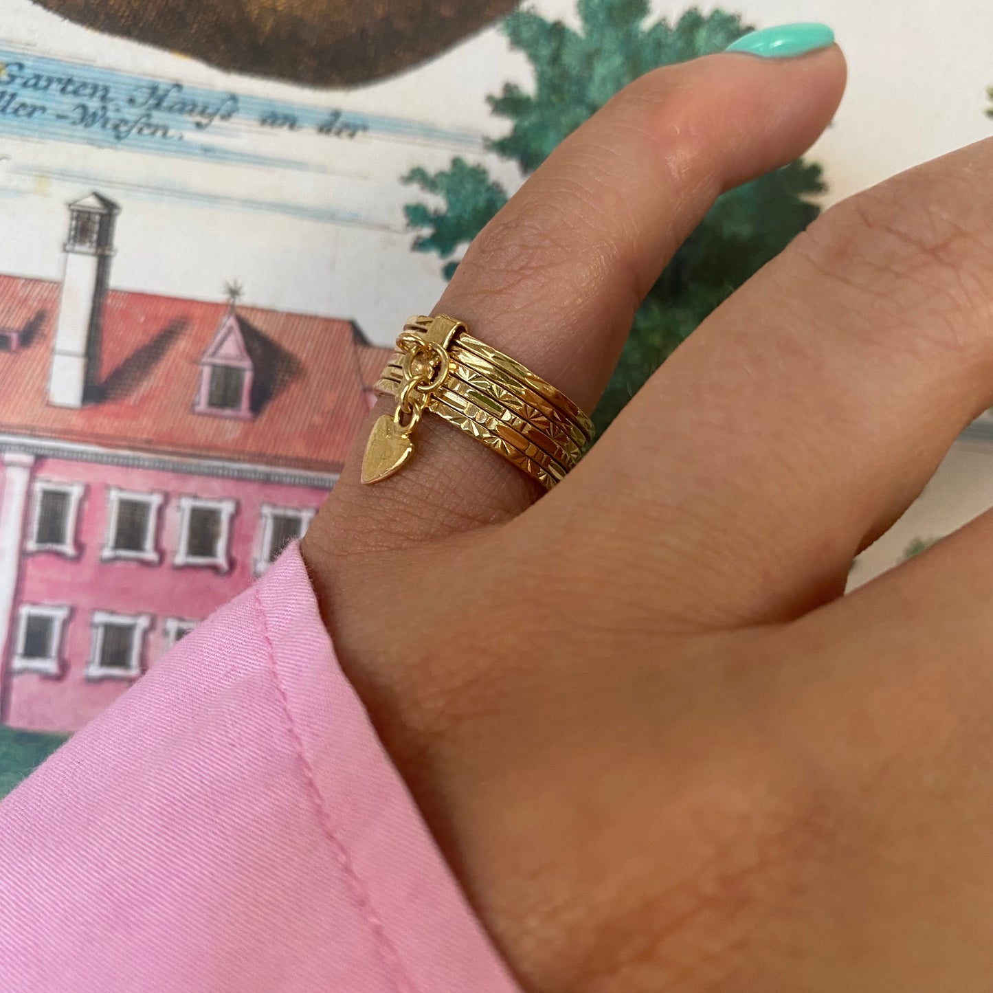18 carat gold 6 engraved stack ring with heart pendant