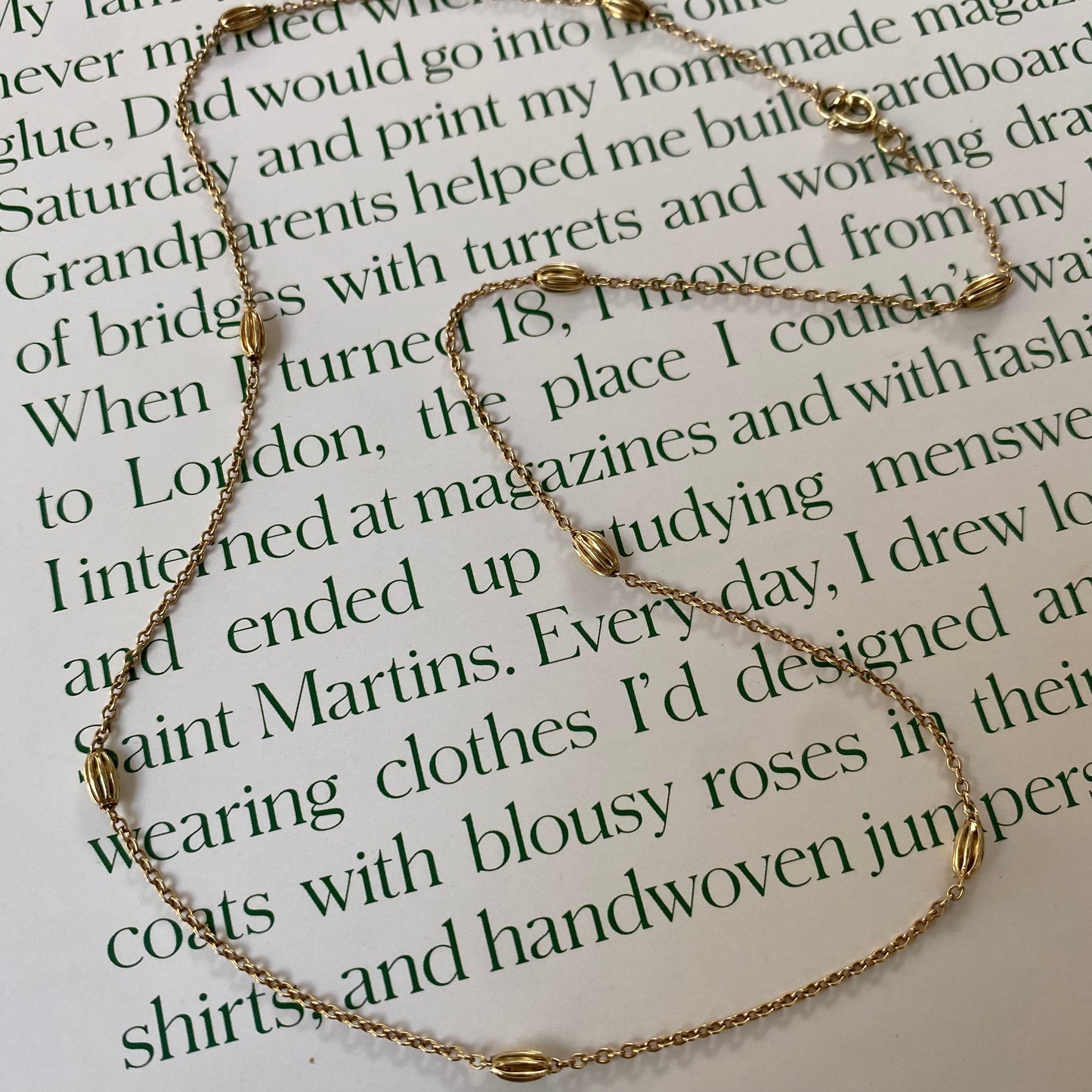 14 carat gold necklace with gold fennel seed beads