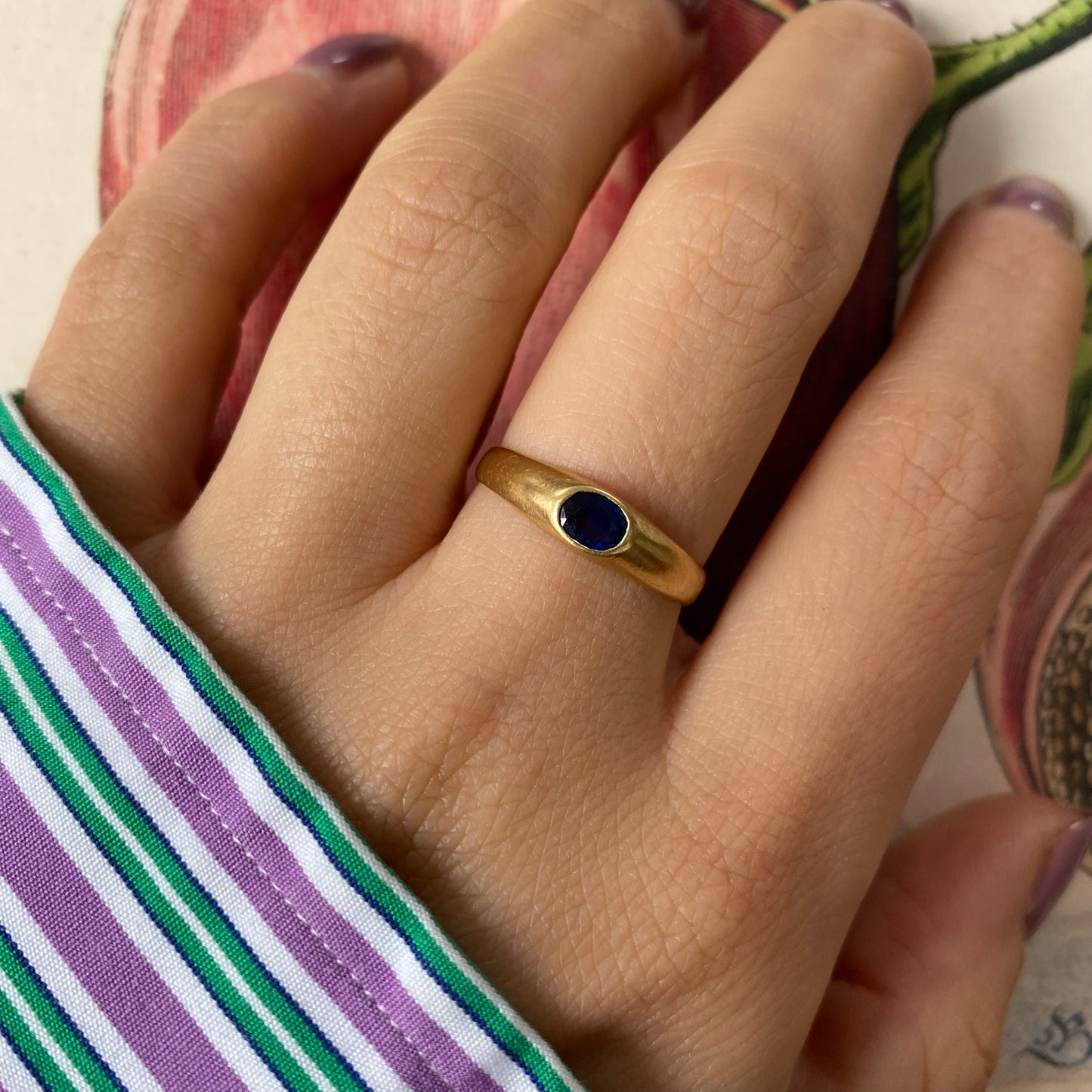 18 carat gold gypsy ring with single oval sapphire
