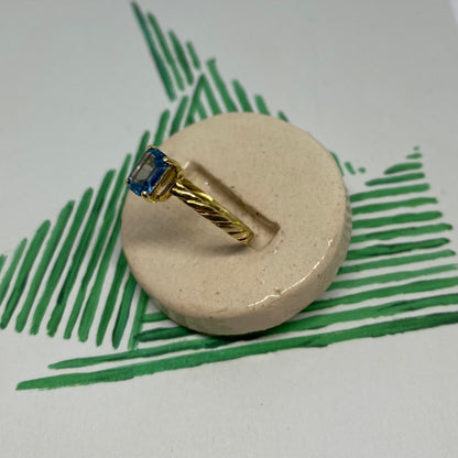 18 carat gold solitaire rectangle aquamarine ring with twisted band