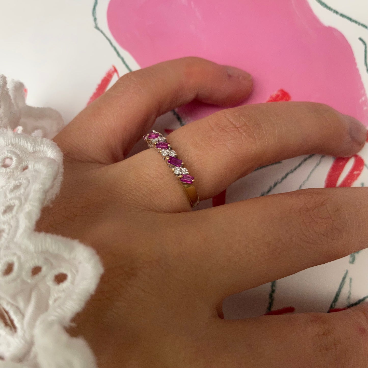 18 carat gold ruby and diamond half eternity ring