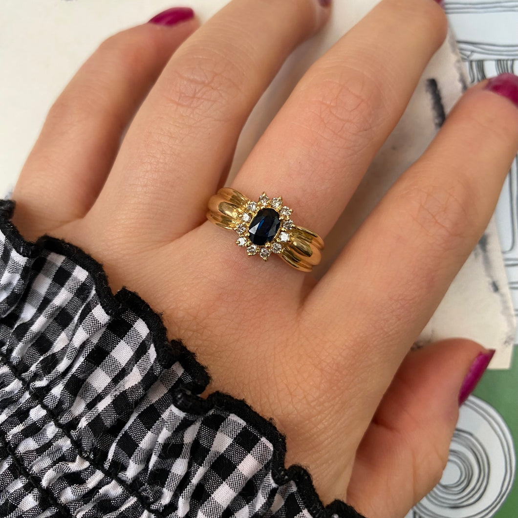 18 carat gold sapphire and diamond cluster ring