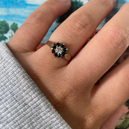 9 carat blue spinel and diamond daisy shape ring